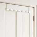 White buttoned edge metal door hanger