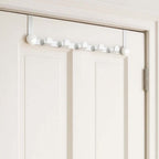 White buttoned edge metal door hanger