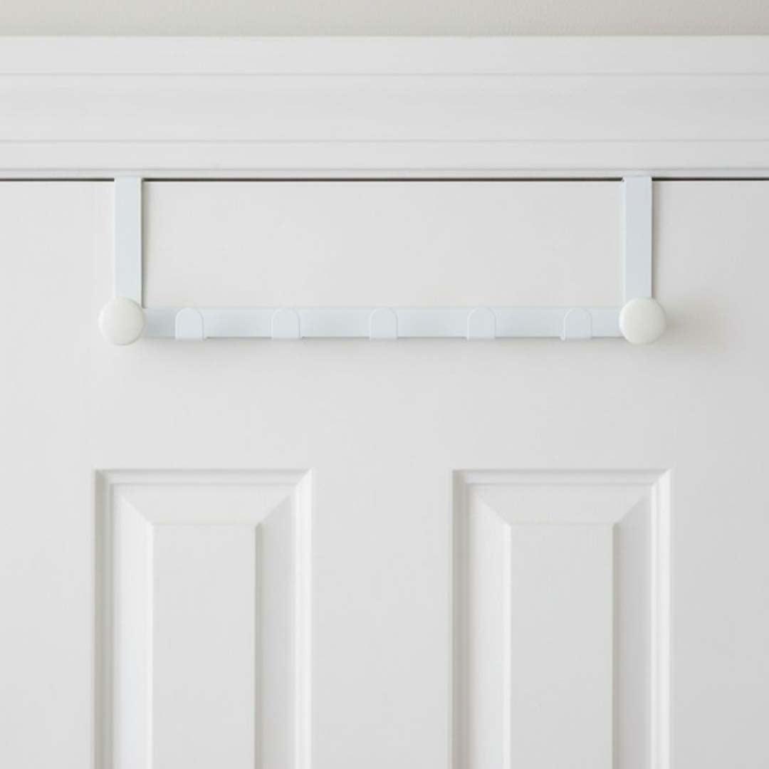 White buttoned edge metal door hanger